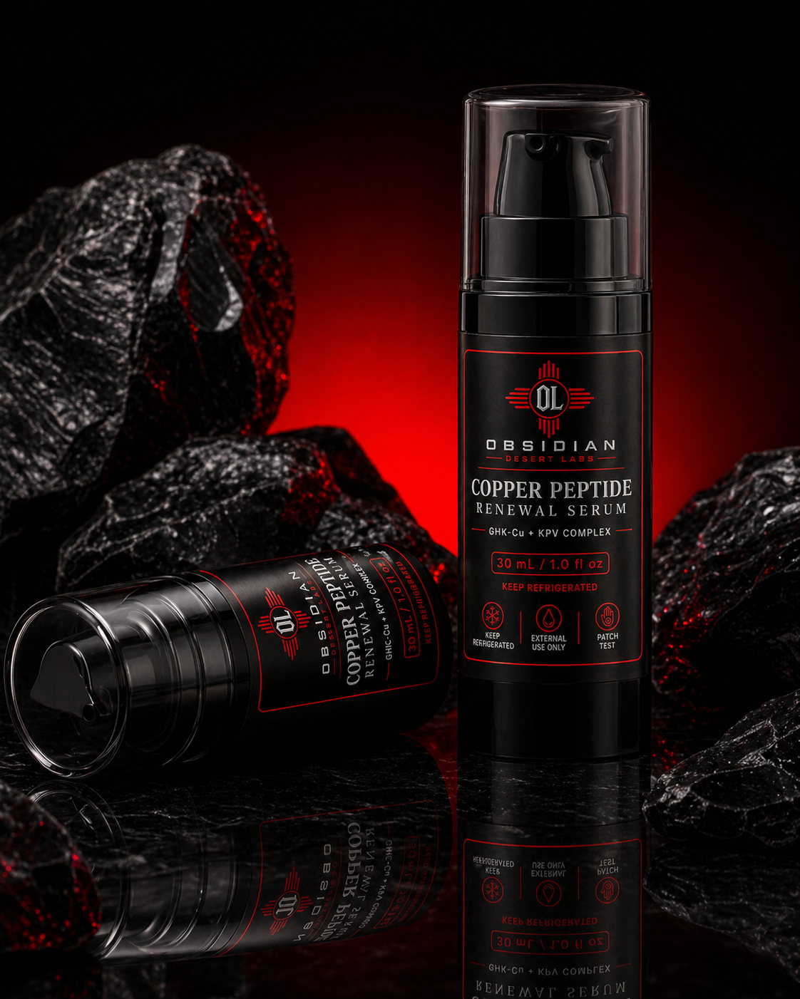 Two Obsidian Desert Labs serum bottles with dramatic red lighting